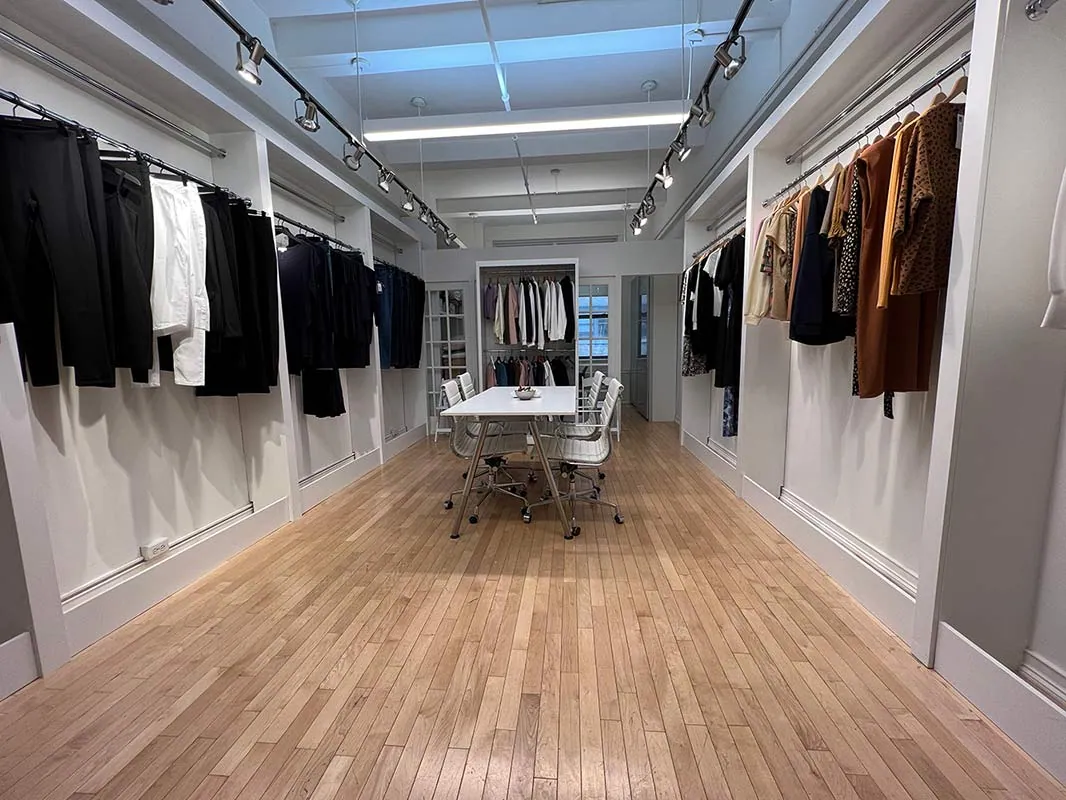 Apparel showroom with garment rails