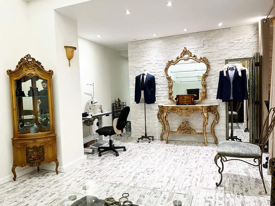 Tailoring atelier with a gilt mirror and console