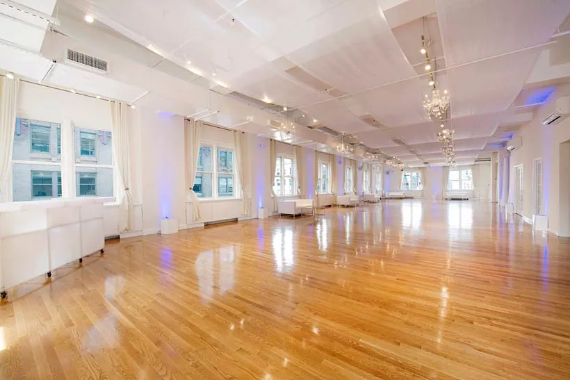 Long open floor with polished wood floors